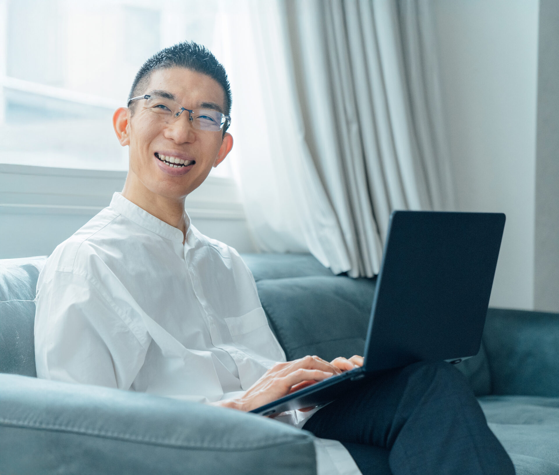 都築 宏一